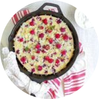 a pan of food with berries on it