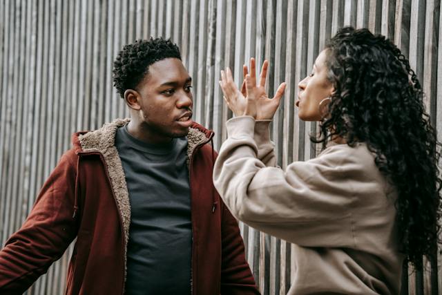 A man and a woman having a heated disagreement.