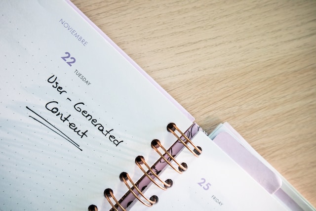 A planner with the words “User Generated Content” written on it. 