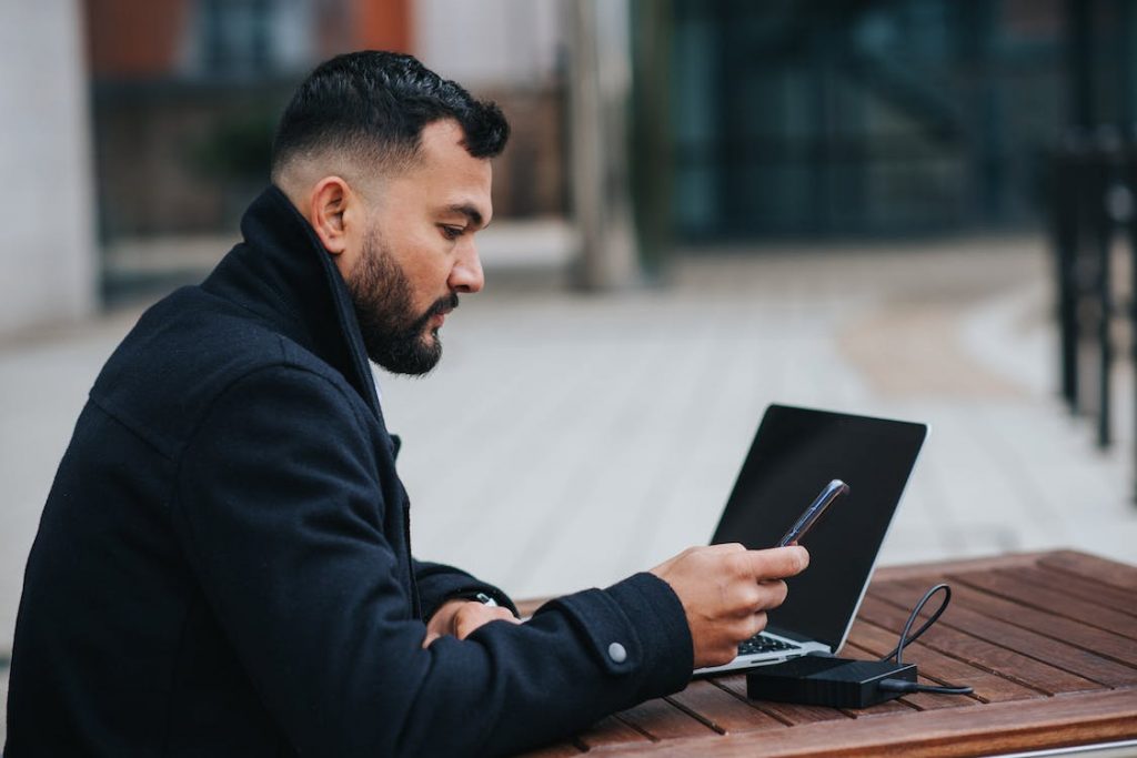 A serious man chatting after switching Instagram to offline mode.