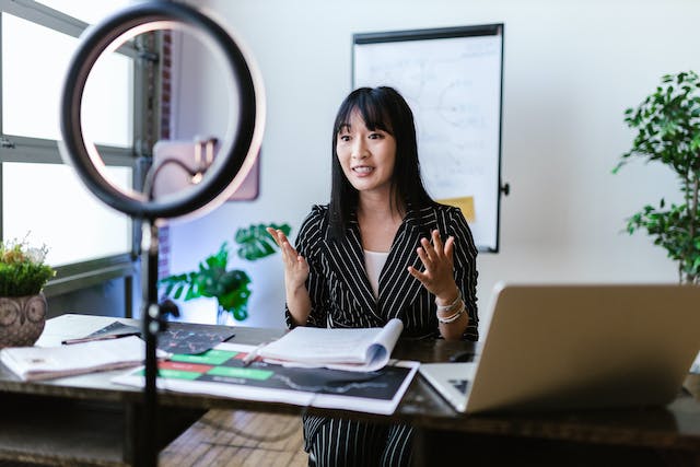 An influencer recording a video for her followers.