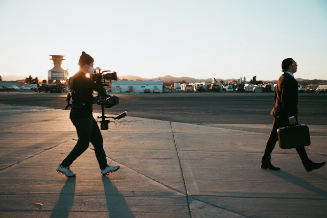 A person is getting his video shot while walking.