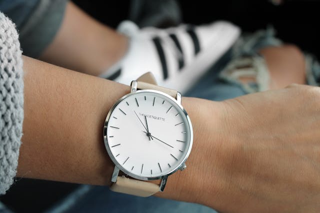 A close-up shot of a watch on someone’s wrist.