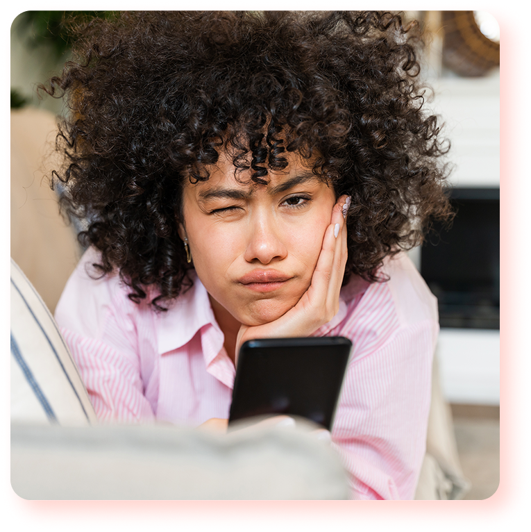 Rectangle-4722png | Path Social Stock image of an Instagram user making an inquisitive face while holding her phone.